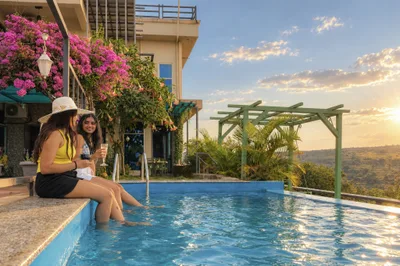 Golden hour poolside relaxation at Meraki Hillside Villa