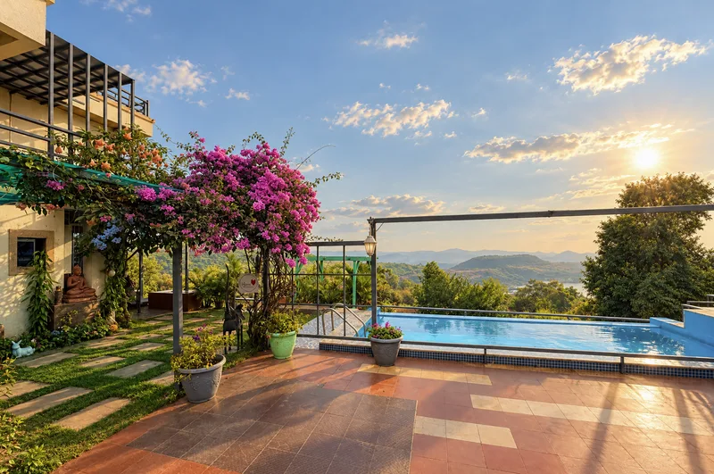 Meraki Hillside Villa garden with infinity pool overlooking Panchgani valley